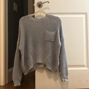 light blue sweater